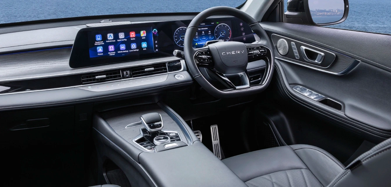 Premium cockpit of the luxurious Chery 8 featuring a widescreen digital display, integrated infotainment system, and refined leather interior finishes