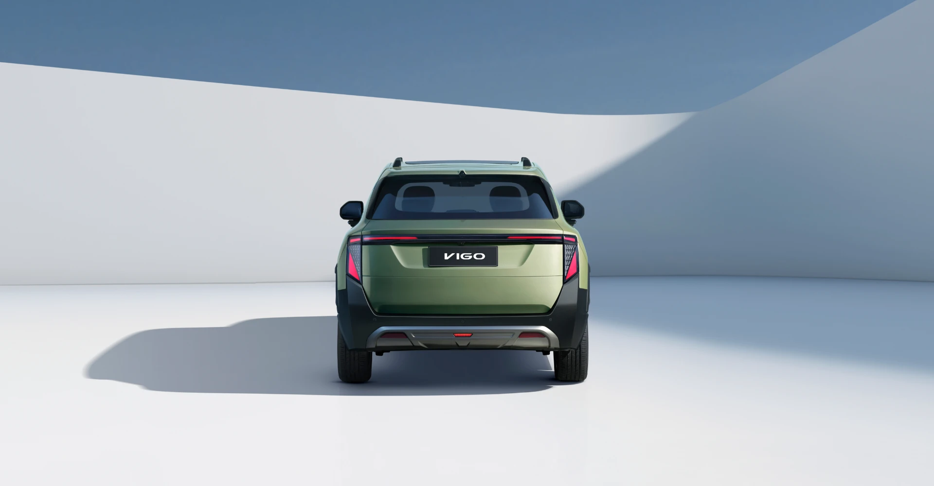 Vista traseira do Dongfeng VIGO One Edition verde, com assinatura luminosa LED contínua.