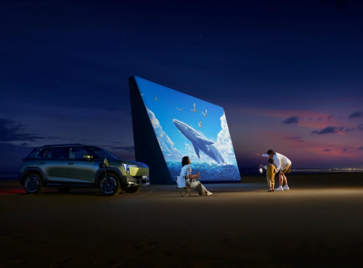 Dongfeng VIGO com função V2L a alimentar um ecrã de cinema ao ar livre.