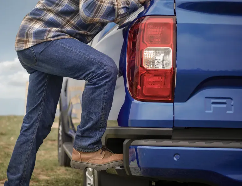 ford ranger feature step that makes it easier to climb into the back of the ranger