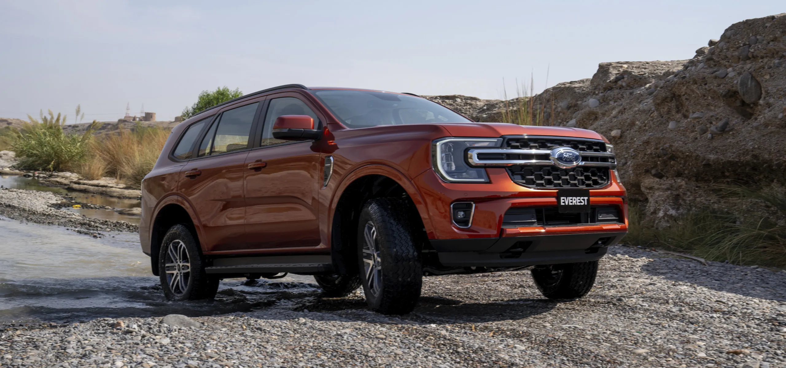 Ford Everest on a path with water