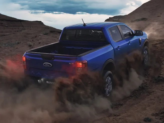 Ford Ranger driving through the dunes in the desert