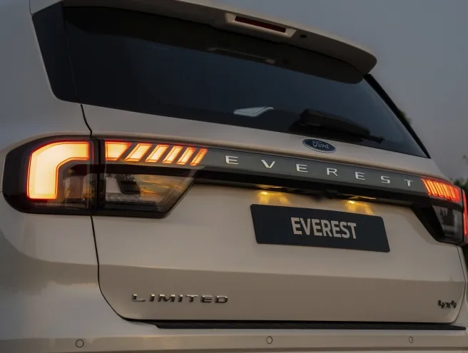 Rear of the Ford Everest with its lights and its name prominently displayed in the middle.