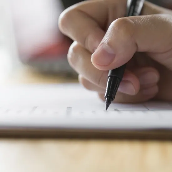 a person reading a checklist
