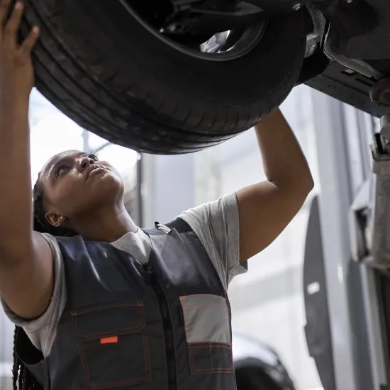 Mechanic changing a car tire