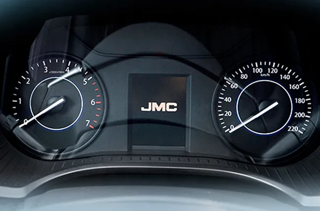 Dashboard with prominent speedometer and analog tachometer